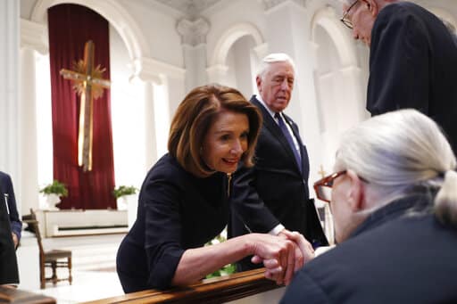 House Speaker Nancy Pelosi and Rep. Steny Hoyer, D-Md., greet family members before a funeral service for former Rep. John Dingell, Thursday, Feb. 14, 2019 at Holy Trinity Catholic Church in Washington. Dingell, who represented southeast Michigan for 59 years in the House of Representatives, died last week at age 92. (AP Photo/Pablo Martinez Monsivais, Pool)