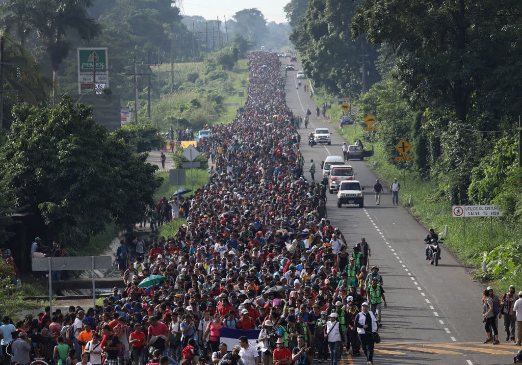 CIUDAD HIDALGO, MEXICO - OCTOBER 21:  A migrant caravan walks into the interior of Mexico after crossing the Guatemalan border on October 21, 2018 near Ciudad Hidalgo, Mexico The caravan of Central Americans plans to eventually reach the United States. U.S. President Donald Trump has threatened to cancel the recent trade deal with Mexico and withhold aid to Central American countries if the caravan isn't stopped before reaching the U.S.  (Photo by John Moore/Getty Images)