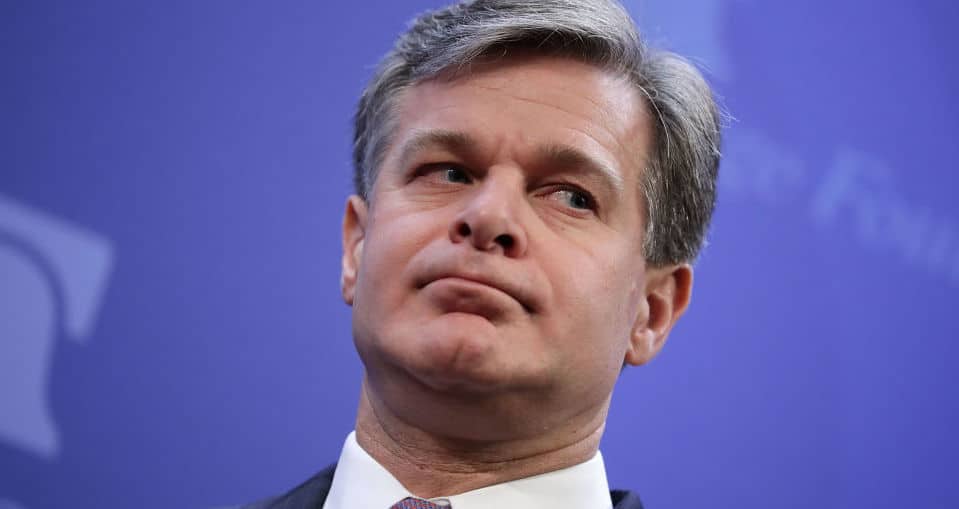 Federal Bureau of Investigation Director Christopher Wray prepares to deliver remarks arguing for the renewal of Section 702 of the Foreign Intelligence Surveillance Act at the Heritage Foundation October 13, 2017 in Washington, DC.