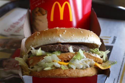 FILE - In this Jan. 21, 2014, file photo, a McDonald's Big Mac sandwich is seen at a McDonald's restaurant in Robinson Township, Pa. McDonald's told the AP on May 17, 2017,
that a story circulating online that McDonald's hamburgers uses earthworms as filler for its burgers is untrue. (AP Photo/Gene J. Puskar, File)