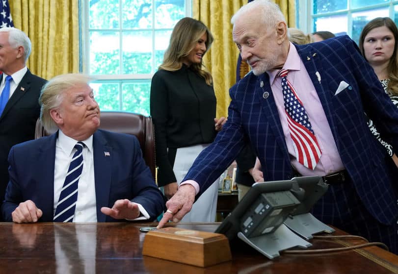 Apollo 11 astronaut Buzz Aldrin (R) talks with U.S. President Donald Trump as they commemorate the 50th anniversary of the moon landing in the Oval Office at the White House July 19, 2019 in Washington, DC.