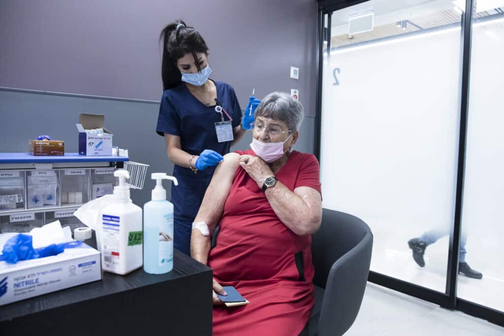 Mary Ravid, a chronic leukemia patient receives her third dose of COVID19 vaccine at Sheba Medical Center on July 14, 2021 in Ramat Gan, Israel.