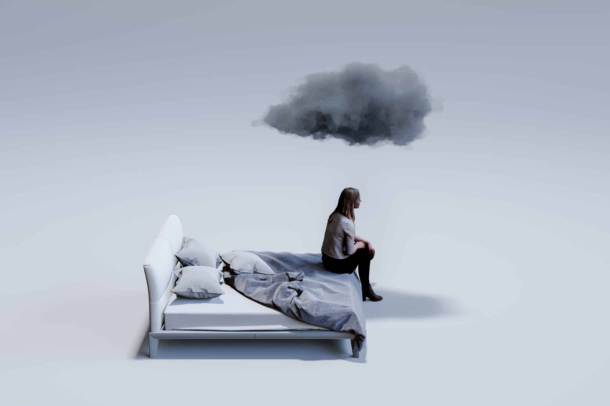 Computer graphic of sad mid adult woman sitting on corner of double bed with dark cloud above head. Depression and relationship difficulties concept.