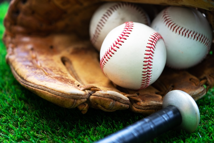 A close up image  of  baseball,baseball glove,baseball bat