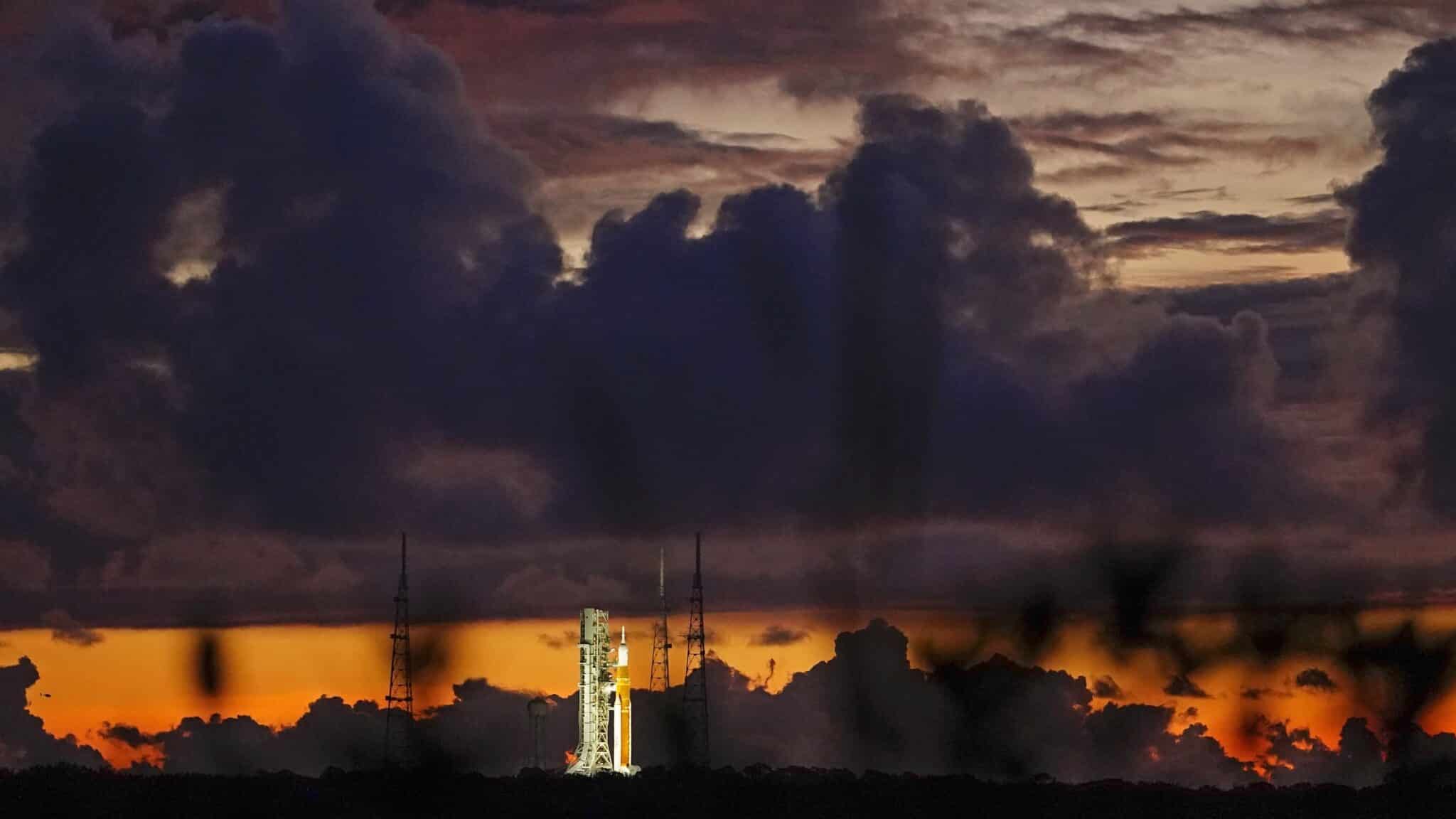The NASA moon rocket stands ready at sunrise on Pad 39B before the Artemis 1 mission to orbit the moon at the Kennedy Space Center, Monday, Aug. 29, 2022, in Cape Canaveral, Fla. (AP Photo/Brynn Anderson)