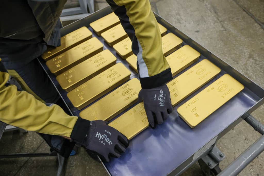A worker loads 12,5 kilogram gold ingots onto a trolley ready for distribution at the JSC Krastsvetmet non-ferrous metals plant in Krasnoyarsk, Russia, on Monday, July 12, 2021. Gold headed for its second decline in three sessions as strength in the dollar and equities diminished demand for the metal as an alternative asset. Photographer: Andrey Rudakov/Bloomberg via Getty Images