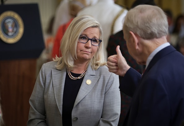 WASHINGTON, DC - JULY 7: Rep. Liz Cheney (R-WY) gets a thumbs up from former Sen. Joe Lieberman (D-CT) before the start of a Presidential Medal of Freedom ceremony in the East Room of the White House July 7, 2022 in Washington, DC. President Biden awarded the nation's highest civilian honor to 17 recipients. The award honors individuals who have made exemplary contributions to the prosperity, values, or security of the United States, world peace, or other significant societal, public or private endeavors. (Photo by Alex Wong/Getty Images)
