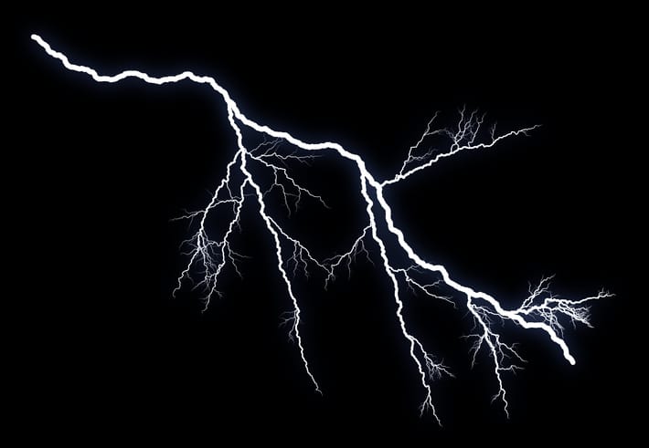 light and flash of lightning on a black background.