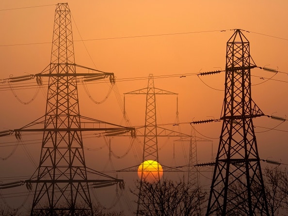Electricity pylons in Kennington, South Oxford at sunrise. (Photo by: Planet One Images/UCG/Universal Images Group via Getty Images)