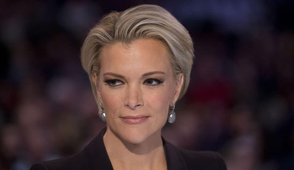 Fox News anchor Megyn Kelly waits to begin the Republican presidential candidate debate at the Iowa Events Center in Des Moines, Iowa, U.S., on Thursday, Jan. 28, 2016. Candidates from both parties are crisscrossing Iowa, an agricultural state of about 3 million people in the U.S. heartland that will hold the first votes of the 2016 election on Feb. 1. Photographer: Andrew Harrer/Bloomberg via Getty Images