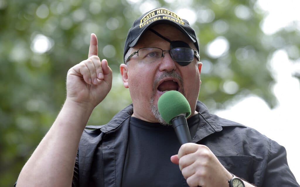 FILE - In this Sunday, June 25, 2017 file photo, Stewart Rhodes, founder of the Oath Keepers, speaks during a rally outside the White House in Washington. Rhodes has been arrested and charged with seditious conspiracy in the Jan. 6 attack on the U.S. Capitol. The Justice Department announced the charges against Rhodes on Thursday.  (AP Photo/Susan Walsh, File)