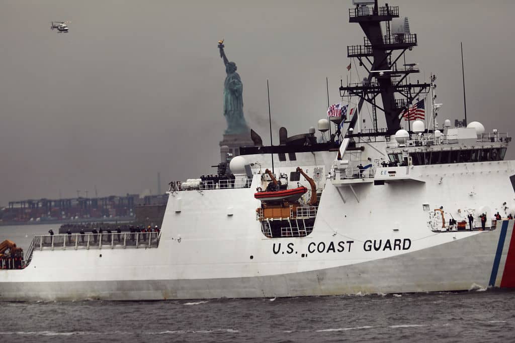 NEW YORK, NY - MAY 24:  A Coast Guard ship makes its way past the Statue of Liberty on the opening day of Fleet Week on May 24, 2017 in New York City.  Now in its 29th year, Fleet Week brings more than 3,700 U.S. and Canadian service members to Manhattan through Memorial Day. The event includes ship tours, military demonstrations, musical performances and other events.  (Photo by Spencer Platt/Getty Images)