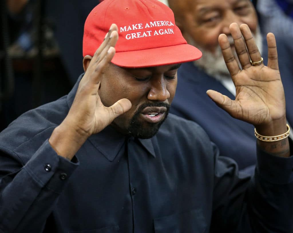 WASHINGTON, DC - OCTOBER 11:  (AFP OUT) Rapper Kanye West speaks during a meeting with U.S. President Donald Trump in the Oval office of the White House on October 11, 2018 in Washington, DC. (Photo by Oliver Contreras - Pool/Getty Images)