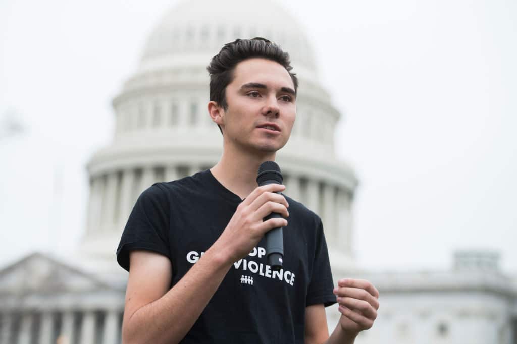 UNITED STATES - MARCH 25: David Hogg, a survivor of the Marjory Stoneman Douglas High School shooting in Parkland, Fla., speaks on the East Front of the Capitol during a rally to organize letters to be delivered to congressional offices calling for an expansion of background checks on gun purchases on Monday, March 25, 2019. The Letters for Change event was held in commemoration of the one year anniversary of the March For Our Lives DC. (Photo By Tom Williams/CQ Roll Call)