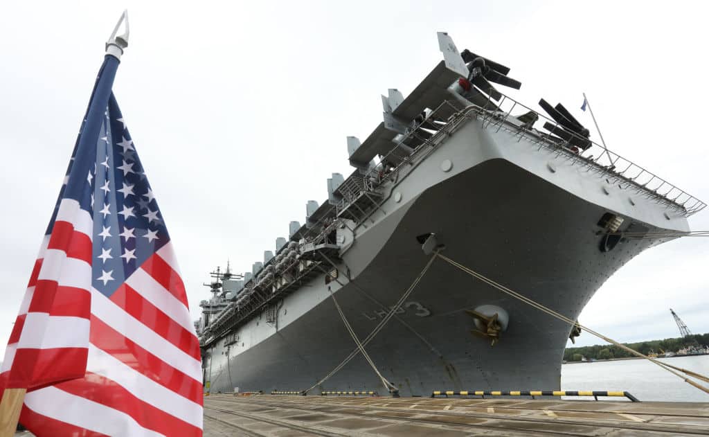 The USS Kearsarge (LHD-3) Wasp-class amphibious assault ship of the US Navy is pictured at the seaport of Klaipeda, Lithuania, on August 22, 2022. - The Wasp-class amphibious assault ship USS Kearsarge (LHD 3), flagship of the Kearsarge Amphibious Ready Group and 22nd Marine Expeditionary Unit, arrived in Klaipeda, Lithuania for a scheduled port visit. (Photo by PETRAS MALUKAS / AFP) (Photo by PETRAS MALUKAS/AFP via Getty Images)