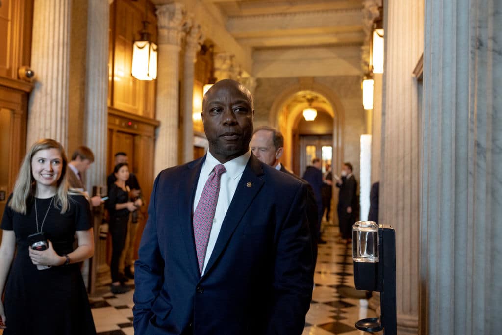 WASHINGTON, DC - SEPTEMBER 07: Sen. Tim Scott (R-SC) walks to a policy luncheon with Senate Republicans at the U.S. Capitol building on September 07, 2022 in Washington, DC. Senators are working to negotiate several legislative items including the Marriage Equality Bill and funding for more Covid-19 vaccinations. (Photo by Anna Moneymaker/Getty Images)