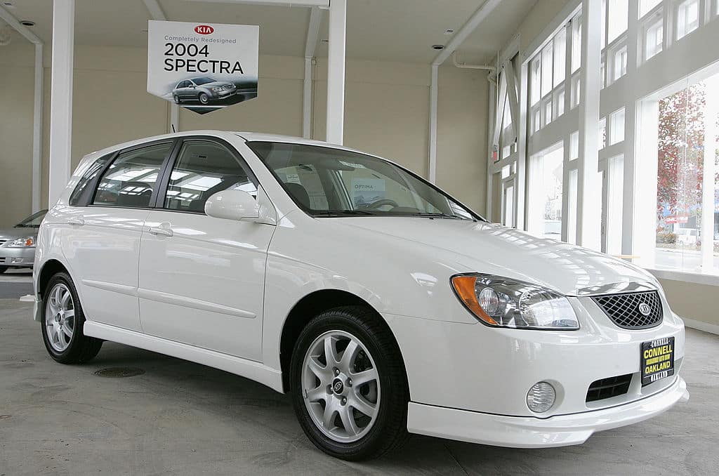 OAKLAND, CA - DECEMBER 20:  A 2005 KIA Spectra is seen on display at a KIA Dealership December 20, 2004 in Oakland, California. The Kia Spectra, a small, four-door sedan that starts at $13,240, received the insurance industry?s worst safety rating in a frontal crash test, the first vehicle to receive such a rating since the 2001 Chevrolet Cavalier. (Photo by Justin Sullivan/Getty Images)
