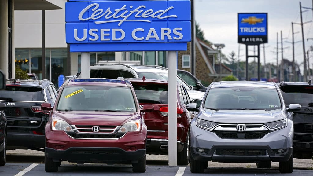 Used car are on display on a lot in Wexford, Pa., Thursday, Sept. 29, 2022. (AP Photo/Gene J. Puskar)