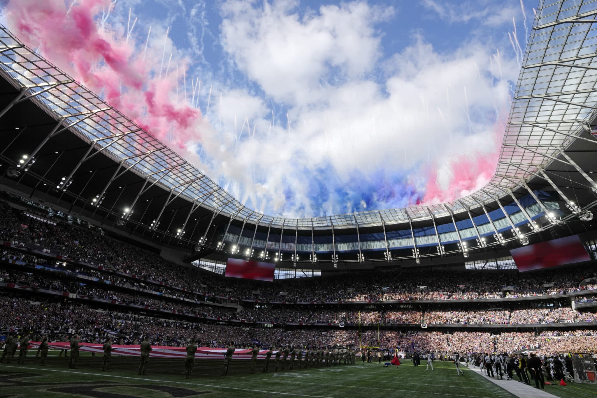 Phoebe Haines sings the US national anthem before an NFL match between Minnesota Vikings and New Orleans Saints at the Tottenham Hotspur stadium in London, Sunday, Oct. 2, 2022. (AP Photo/Kirsty Wigglesworth)