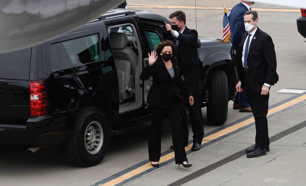 US Vice President Kamala Harris waves as she steps out of her motorcade to board Air Force Two at Metro Oakland International Airport (OAK) on April 5, 2021 in Oakland, California. (Photo by Patrick T. FALLON / AFP) (Photo by PATRICK T. FALLON/AFP via Getty Images)