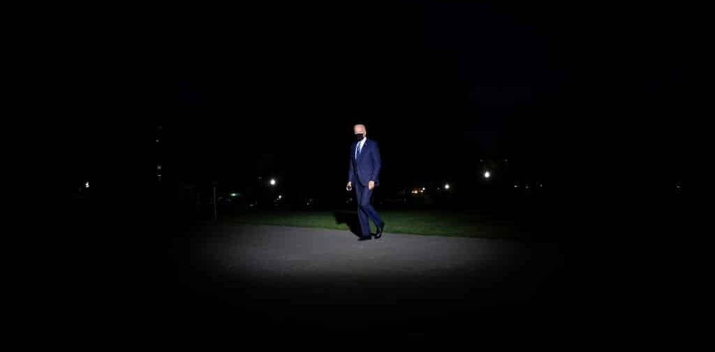 TOPSHOT - US President Joe Biden walks from Marine One to the White House, October 7, 2021, in Washington, DC. (Photo by Brendan Smialowski / AFP) (Photo by BRENDAN SMIALOWSKI/AFP via Getty Images)