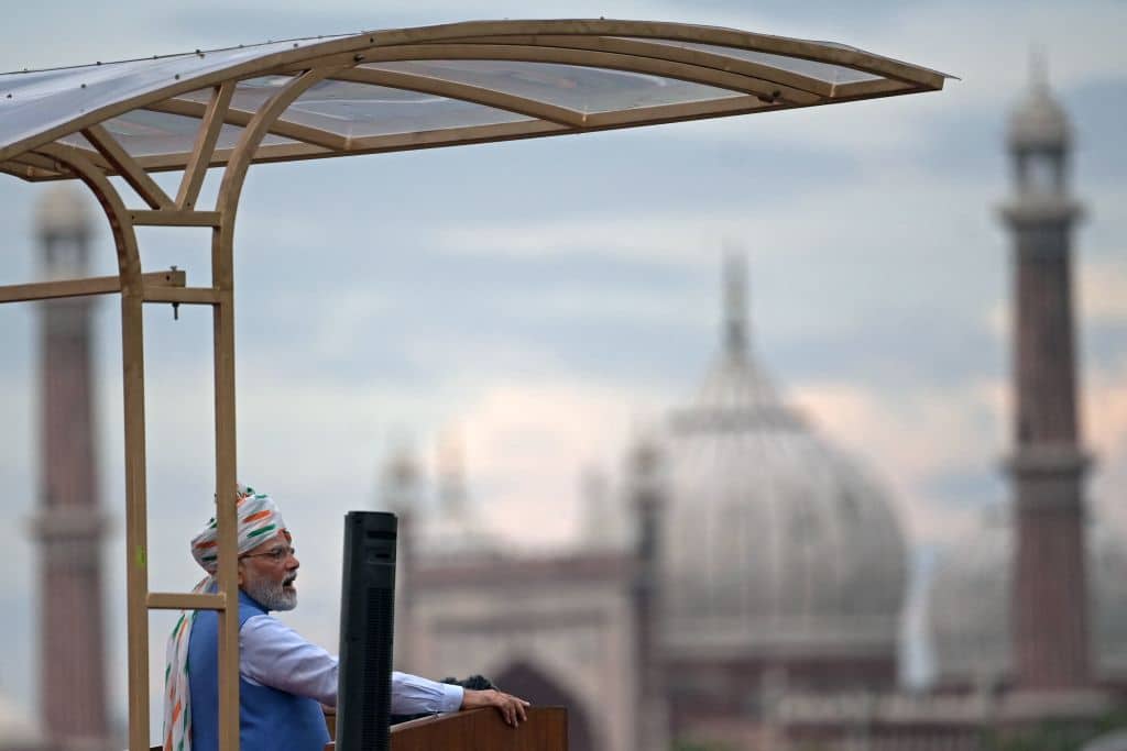 Indias Prime Minister Narendra Modi addresses the nation from the ramparts of the Red Fort during the celebrations to mark countrys Independence Day in New Delhi on August 15, 2022. - India marked the 75th anniversary of independence on August 15 with Modi giving a speech from Delhi's historic Red Fort, hung with freedom fighters' pictures and guarded by robot elephants. (Photo by Money SHARMA / AFP) (Photo by MONEY SHARMA/AFP via Getty Images)