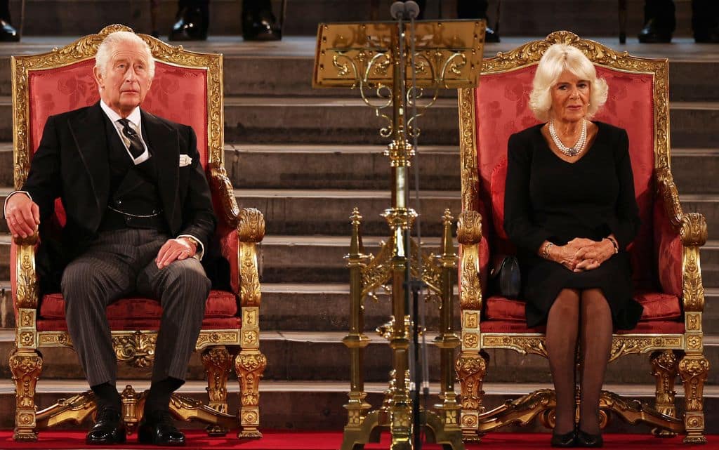 TOPSHOT - Britain's King Charles III and Britain's Camilla, Queen Consort attend the presentation of Addresses by both Houses of Parliament in Westminster Hall, inside the Palace of Westminster, central London on September 12, 2022, following the death of Queen Elizabeth II on September 8. (Photo by Dan Kitwood / POOL / AFP) (Photo by DAN KITWOOD/POOL/AFP via Getty Images)