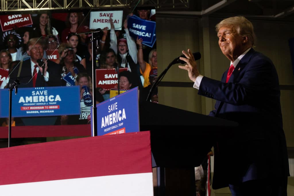 WARREN, MI - OCTOBER 01: Former President Donald Trump speaks during a Save America rally on October 1, 2022 in Warren, Michigan. Trump has endorsed Republican gubernatorial candidate Tudor Dixon, Secretary of State candidate Kristina Karamo, Attorney General candidate Matthew DePerno, and Republican businessman John James ahead of the November midterm election. (Photo by Emily Elconin/Getty Images)