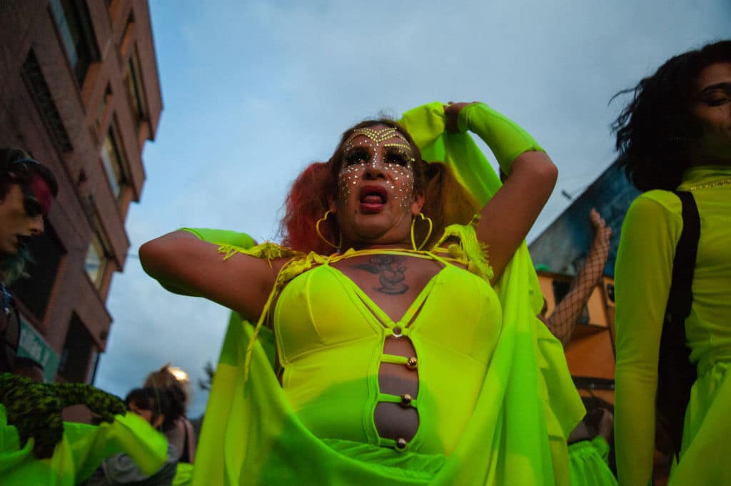 A drag transgender community member dances during the annual 'Yo Marcho Trans' protest where Transgender females and males protest for the right to live, equalities and to stop crimes against the community in Bogota, Colombia on July 16, 2021. (Photo by: Chepa Beltran/Long Visual Press/Universal Images Group via Getty Images)