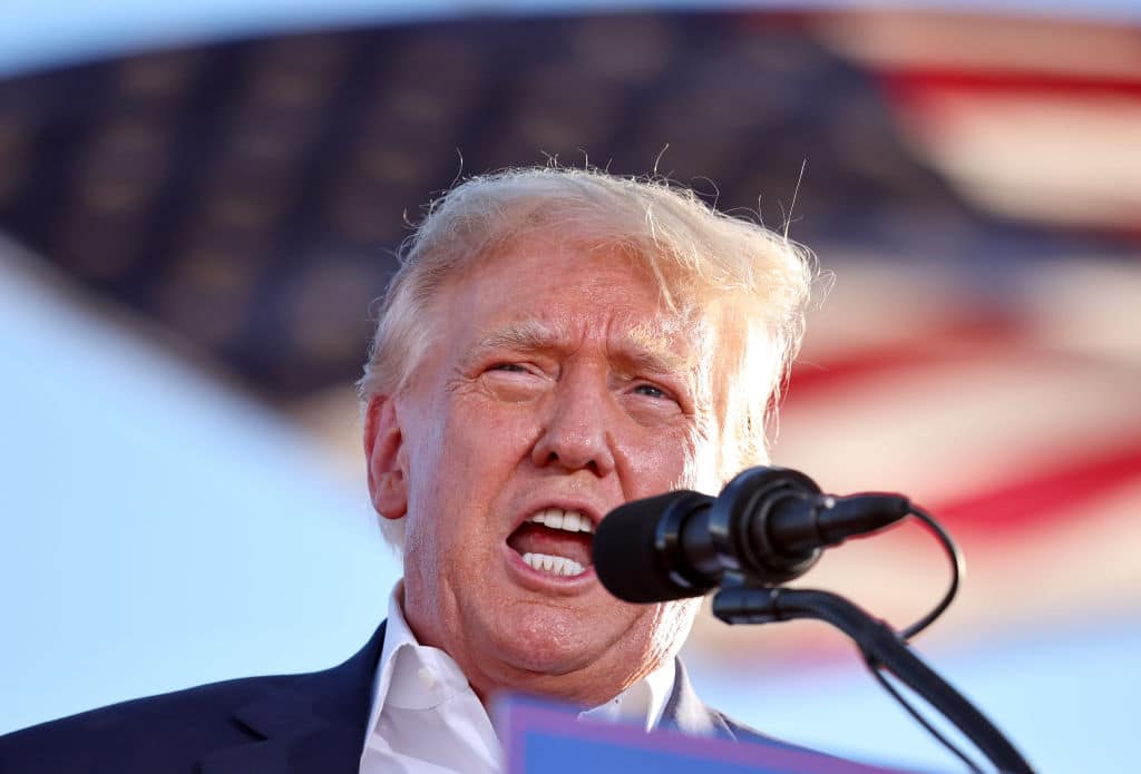 MESA, ARIZONA - OCTOBER 09:  Former U.S. President Donald Trump speaks at a campaign rally at Legacy Sports USA on October 09, 2022 in Mesa, Arizona. Trump was stumping for Arizona GOP candidates, including gubernatorial nominee Kari Lake, ahead of the midterm election on November 8.  (Photo by Mario Tama/Getty Images)
