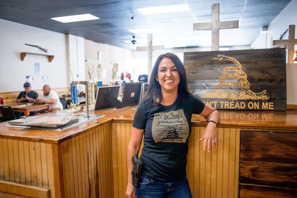 Owner Lauren Boebert poses for a portrait at Shooters Grill in Rifle, Colorado on April 24, 2018. - Lauren Boebert opened Shooters Grill in 2013 with her husband Jason in the small town of Rifle, Colorado, the only city in the United States named after a gun according to them. Shortly after Boebert opened the restaurant, there was a murder in the alley behind it. Boebert went next door to the Tradesmen Gun Store and Pawnshop to speak to the owner, Edward Wilks. Wilks explained to her that you dont need a permit in the state of Colorado to open carry. The next day she started carrying a gun with her. The majority of her staff carries, while it is not a requirement to work there she encourages them to do so if they feel comfortable with it. Customers are also welcome to carry firearms on them as well. The restaurants theme remained heavily country western but revolves alot around the theme of the Second Amendment as well. (Photo by EMILY KASK / AFP)        (Photo credit should read EMILY KASK/AFP via Getty Images)