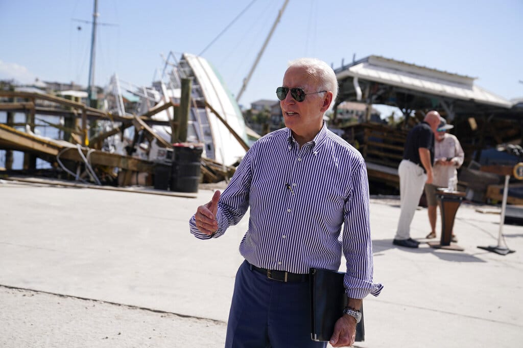 President Joe Biden speaks as he tours an area impacted by Hurricane Ian on Wednesday, Oct. 5, 2022, in Fort Myers Beach, Fla. (AP Photo/Evan Vucci)