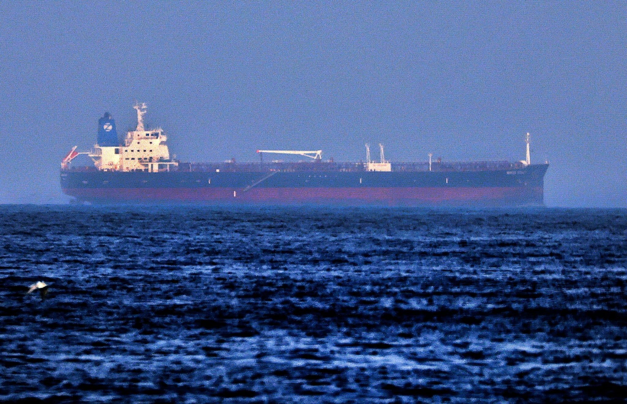 A picture taken on  August 3, 2021 shows the Israeli-linked Japanese-owned tanker MT Mercer Street, off the port of the Gulf Emirate of Fujairah in the United Arab Emirates. - On July 29, two crew members of the tanker MT Mercer Street, managed by a prominent Israeli businessman's company, were killed in what appears to be a drone attack off Oman, the vessel's London-based operator and the US military say, with Israel blaming Iran. (Photo by Karim SAHIB / AFP) (Photo by KARIM SAHIB/AFP via Getty Images)