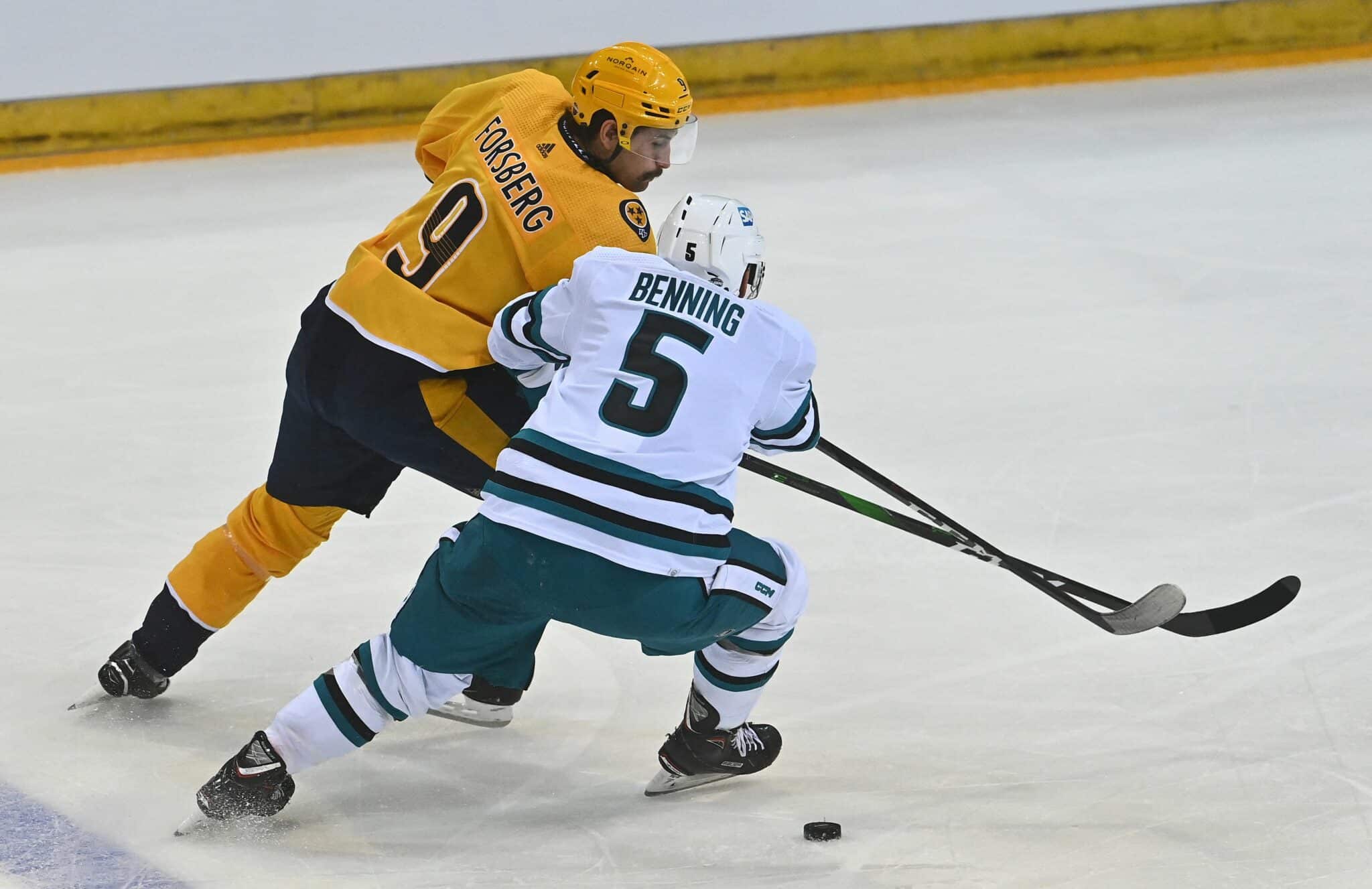 Matt Benning of San Jose Sharks (R) vies for the puck   Filip Forsberg of Nashville Predators during the NHL Global Series Ice Hockey match San Jose Sharks v Nashville Predators in Prague on October 7, 2022. - - RESTRICTED TO EDITORIAL USE (Photo by Michal Cizek / AFP) / RESTRICTED TO EDITORIAL USE (Photo by MICHAL CIZEK/AFP via Getty Images)