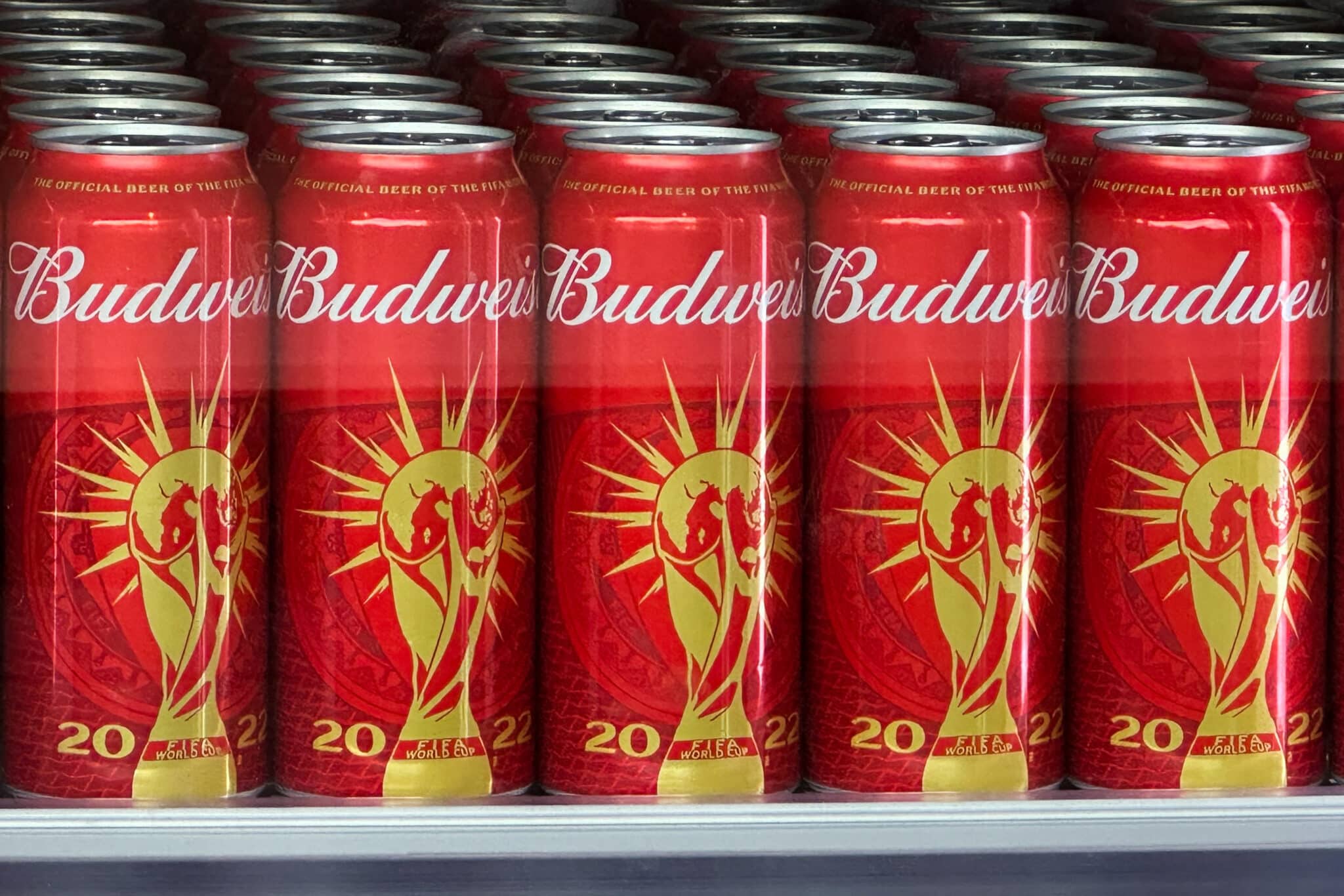 Cans of Budweiser beer featuring the FIFA World Cup logo are displayed in Doha on November 18, 2022 ahead of the Qatar 2022 World Cup football tournament. - The sale of alcohol in Qatar is strictly regulated. (Photo by Patrick T. FALLON / AFP) (Photo by PATRICK T. FALLON/AFP via Getty Images)