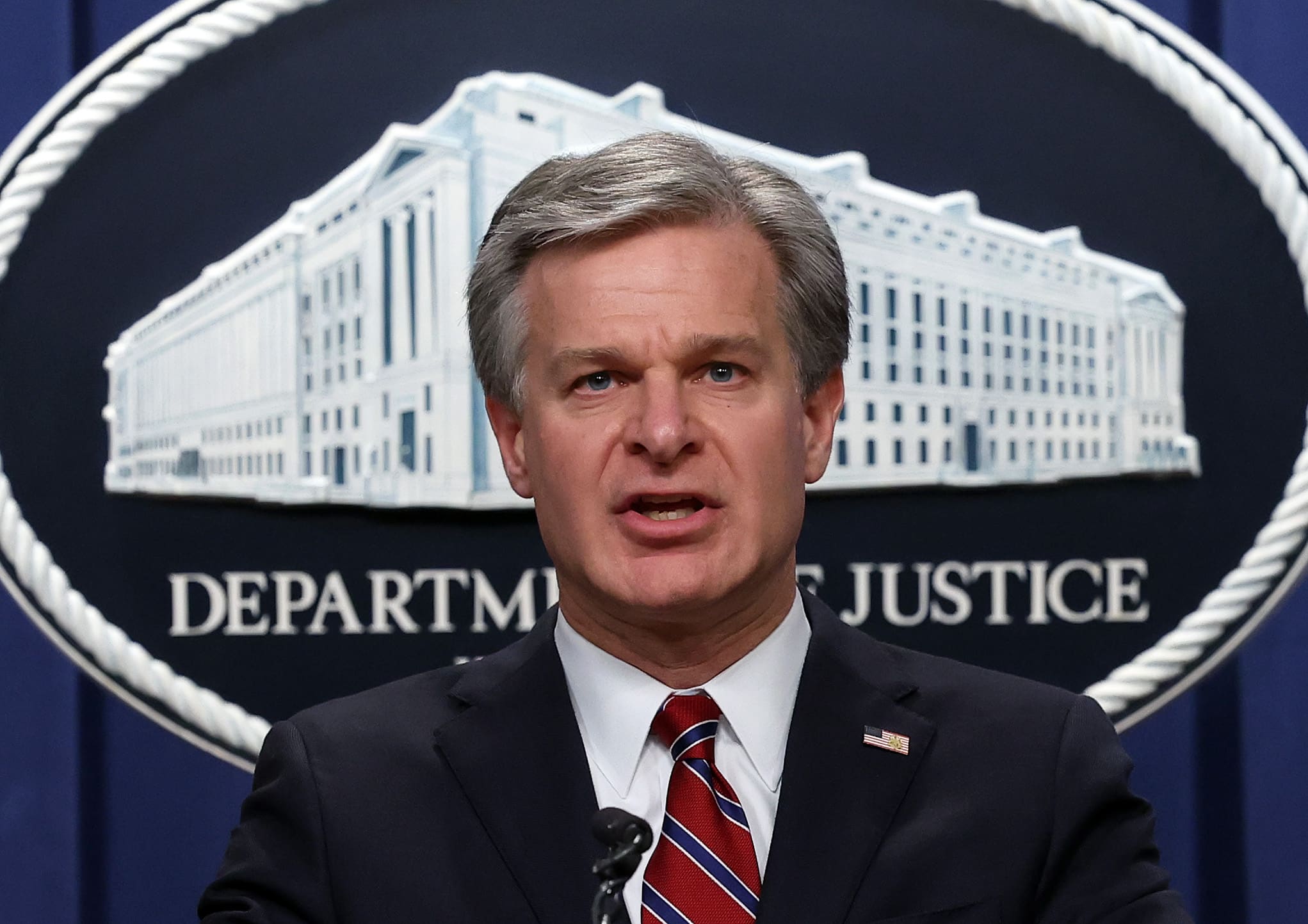 WASHINGTON, DC - OCTOBER 24: F.B.I. Director Christopher Wray speaks at a press conference at the U.S. Department of Justice on on October 24, 2022 in Washington, DC. The Justice Department announced it has charged 13 individuals, including members of the Chinese intelligence and their agents, for alleged efforts to unlawfully exert influence in the United States for the benefit of the government of China. (Photo by Kevin Dietsch/Getty Images)