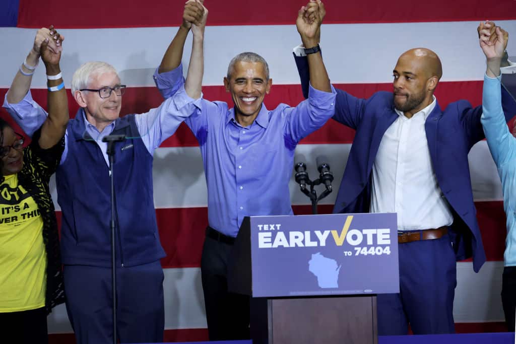MILWAUKEE, WISCONSIN - OCTOBER 29: Former US President Barack Obama stumps for Wisconsin Governor Tony Evers (L) and Democratic candidate for U.S. senate in Wisconsin Mandela Barnes (R) on October 29, 2022 in Milwaukee, Wisconsin. Evers and Barnes, who currently serves as the state's lieutenant governor, are both facing close mid-term races. (Photo by Scott Olson/Getty Images)