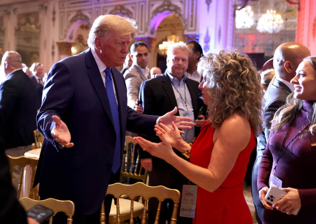 PALM BEACH, FLORIDA - NOVEMBER 08: Former U.S. President Donald Trump mingles with supporters during an election night event at Mar-a-Lago on November 08, 2022 in Palm Beach, Florida. Trump addressed his supporters as the nation awaits the results of the midterm elections.  (Photo by Joe Raedle/Getty Images)