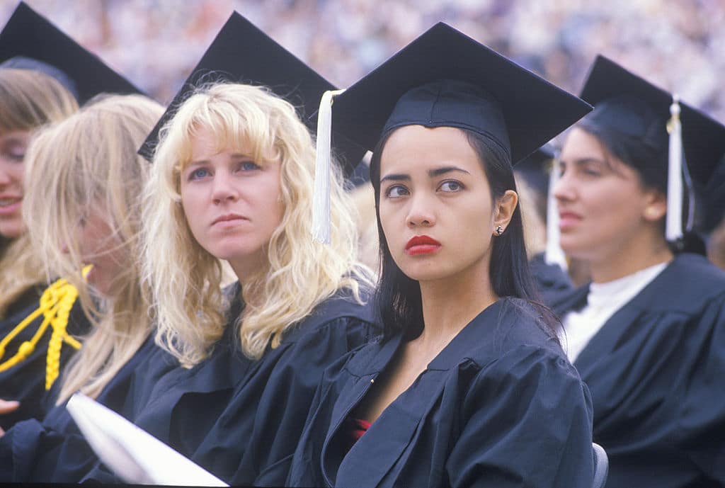 A pair of coeds watching their ceremony, UCLA, Los Angeles, CA (Photo by: Joe Sohm/Visions of America/Universal Images Group via Getty Images)