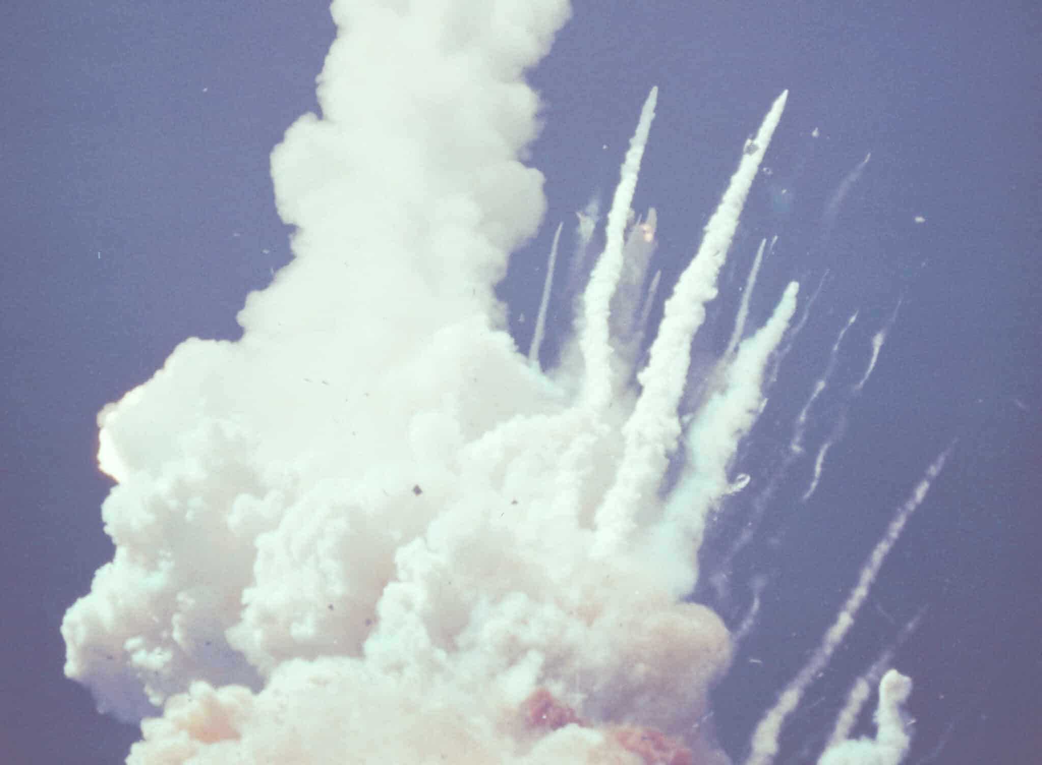 This photo released by NASA, of the 28 January 1986 explosion which destroyed the Space shuttle Challenger and killed all seven crew members 75 seconds after its launch, appears to show a second explosion. (Photo by NASA / AFP) (Photo by -/NASA/AFP via Getty Images)