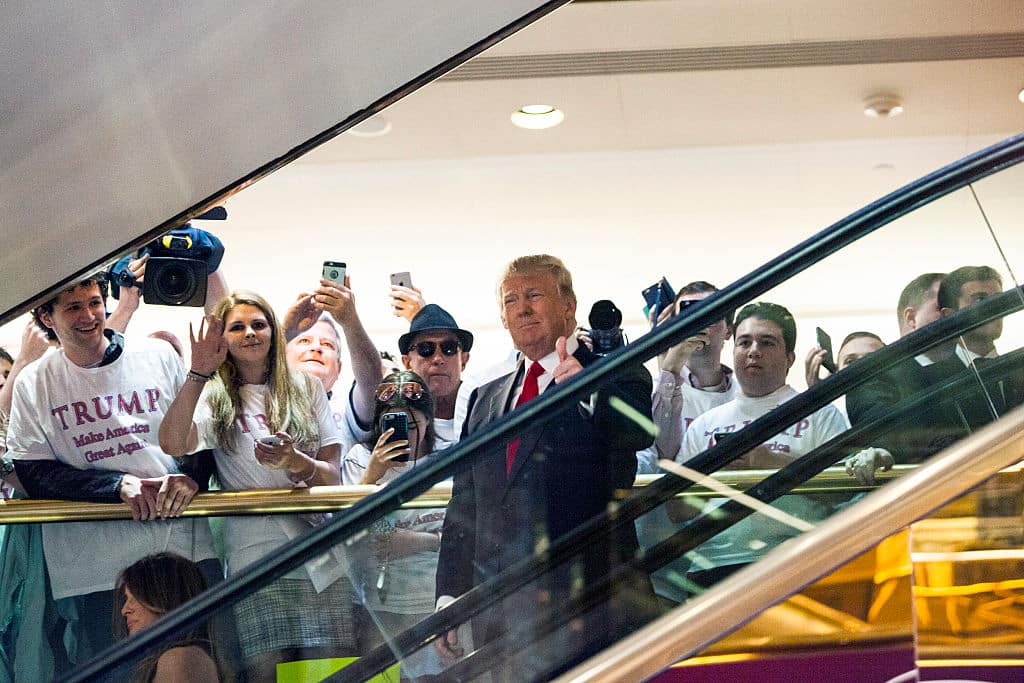 NEW YORK, NY - JUNE 16:   Business mogul Donald Trump rides an escalator to a press event to announce his candidacy for the U.S. presidency at Trump Tower on June 16, 2015 in New York City.  Trump is the 12th Republican who has announced running for the White House.  (Photo by Christopher Gregory/Getty Images)