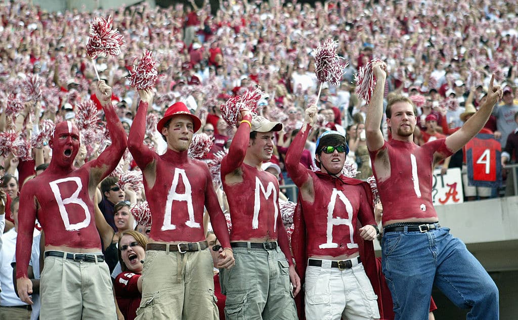 TUSCALOOSA, AL - NOVEMBER 12:  Fans of the University of Alabama Crimson Tide display their body paint during the game with the Louisiana State University Tigers on November 12, 2005 at at Bryant-Denny Stadium in Tuscaloosa, Alabama.  LSU defeated Alabama 16-13 in overtime.   (Photo by Chris Graythen/Getty Images)
