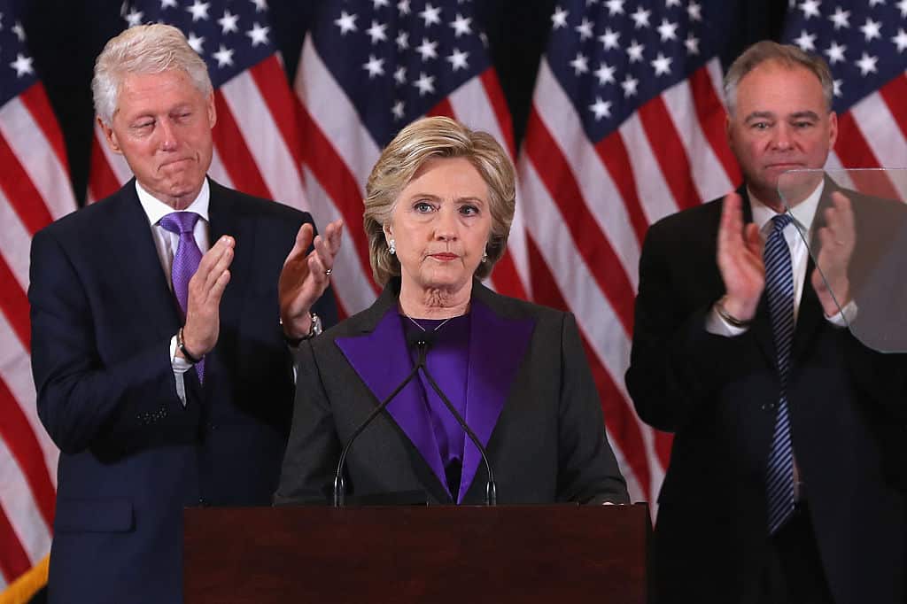 NEW YORK, NY - NOVEMBER 09:  Former Secretary of State Hillary Clinton, accompanied by her husband former President Bill Clinton (L) and running mate Tim Kaine, concedes the presidential election at the New Yorker Hotel on November 9, 2016 in New York City. Republican candidate Donald Trump won the 2016 presidential election in the early hours of the morning in a widely unforeseen upset.  (Photo by Justin Sullivan/Getty Images)
