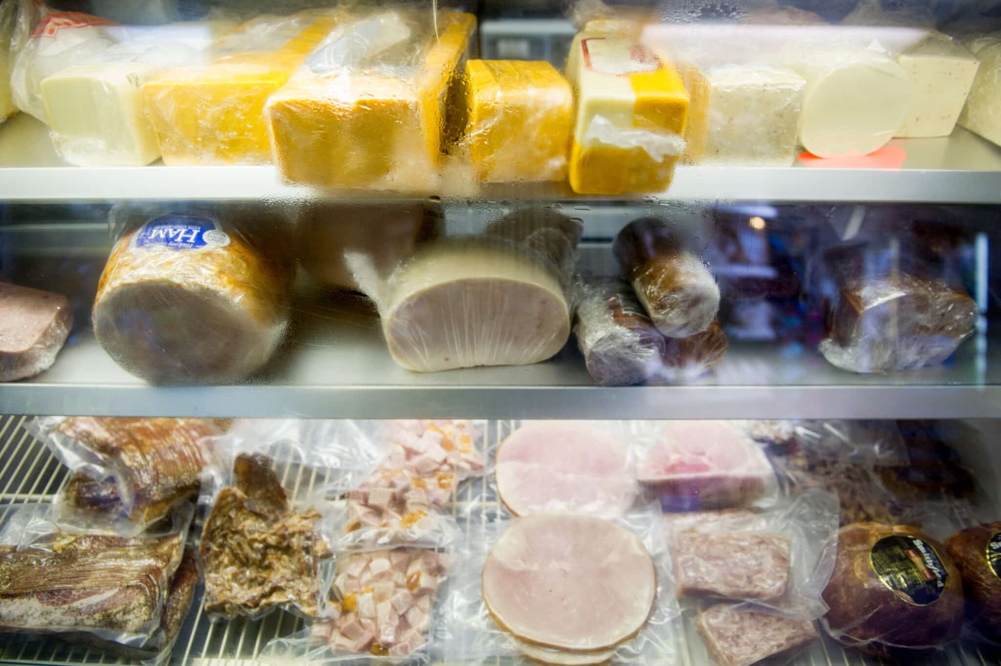 Deli case of cheese and meats in Frostburg, MD. (Photo by: Edwin Remsburg/VW Pics via Getty Images)