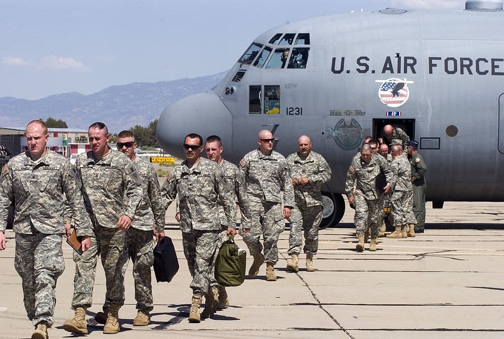 TUCSON, AZ - JULY 11:  Members of the Kentucky National Guard 206th Engineer battalion arrive on a C-130 Hercules transport plane July 11, 2006 in Tucson, Arizona. One hundred members of the unit are here in support of Border Patrol agents maintaining the U.S./Mexican border. The two-week mission is part of President Bush's Operation Jump Start, which calls for 700 National Guard troops from around the country to help in securing the border in Arizona. The Kentucky Guard?s mission will be to build roads, fences and temporary vehicle barriers throughout the Tucson and Yuma sectors of the border.  (Photo by Gary Williams/Getty Images)