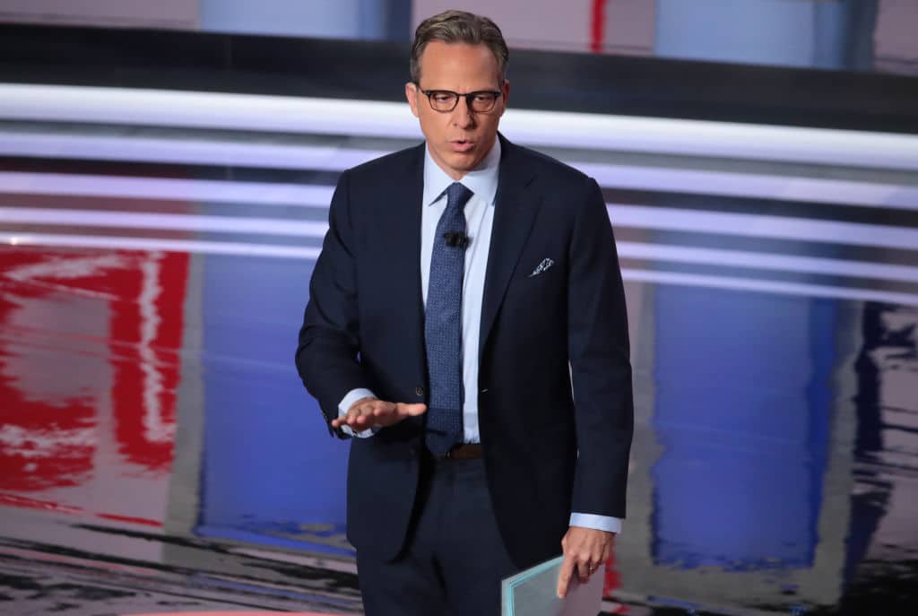 DETROIT, MICHIGAN - JULY 31: CNN moderator Jake Tapper speaks to the crowd attending the Democratic Presidential Debate at the Fox Theatre July 31, 2019 in Detroit, Michigan. 20 Democratic presidential candidates were split into two groups of 10 to take part in the debate sponsored by CNN held over two nights at Detroit’s Fox Theatre.  (Photo by Scott Olson/Getty Images)