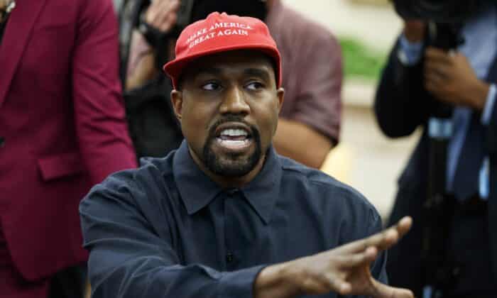 FILE - Rapper Kanye West speaks during a meeting in the Oval Office of the White House with President Donald Trump, Thursday, Oct. 11, 2018, in Washington. Kanye West was escorted out of the California headquarters of athletic shoemaker Skechers Wednesday, Oct. 26, 2022 after he showed up unannounced. Skechers says West, also known as Ye, also engaged in unauthorized filming at its corporate headquarters in Manhattan Beach and was escorted out by two executives.  (AP Photo/Evan Vucci, File)