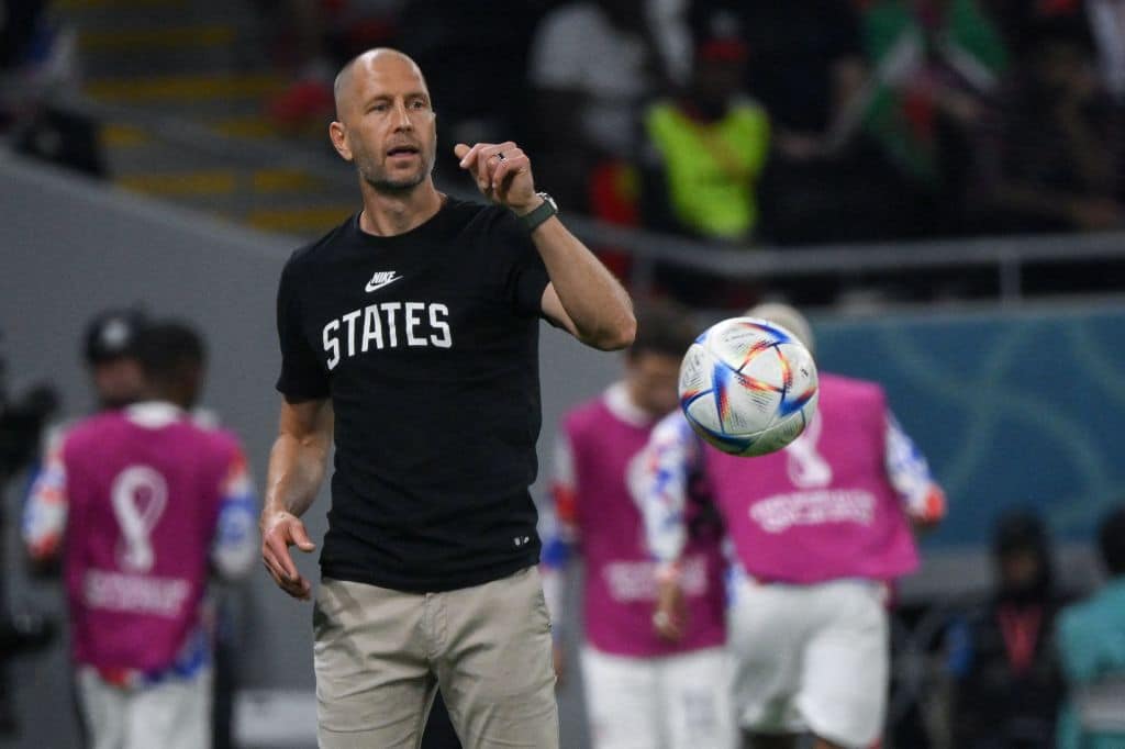 USA's coach #00 Gregg Berhalter shouts instructions to his players from the touchline during the Qatar 2022 World Cup Group B football match between USA and Wales at the Ahmad Bin Ali Stadium in Al-Rayyan, west of Doha on November 21, 2022. (Photo by NICOLAS TUCAT / AFP) (Photo by NICOLAS TUCAT/AFP via Getty Images)
