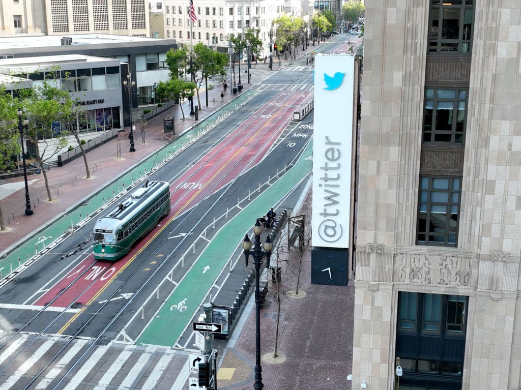 SAN FRANCISCO, CALIFORNIA - APRIL 27: In an aerial view, a sign is seen posted on the exterior of Twitter headquarters on April 27, 2022 in San Francisco, California. Billionaire Elon Musk, CEO of Tesla and Space X, reached an agreement to purchase social media platform Twitter for $44 billion. (Photo by Justin Sullivan/Getty Images)