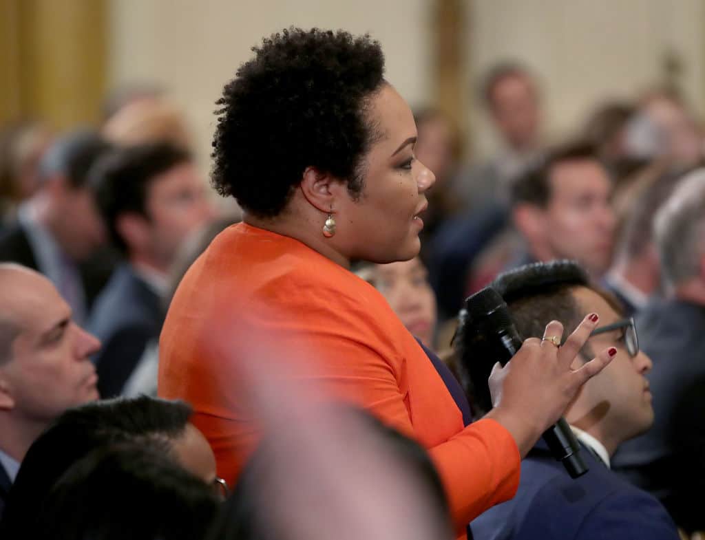 WASHINGTON, DC - NOVEMBER 07: Yamiche Alcindor of PBS NewsHour asks a question to U.S. President Donald Trump after remarks by the President a day after the midterm elections on November 7, 2018 in the East Room of the White House in Washington, DC. Republicans kept the Senate majority but lost control of the House to the Democrats. (Photo by Mark Wilson/Getty Images)